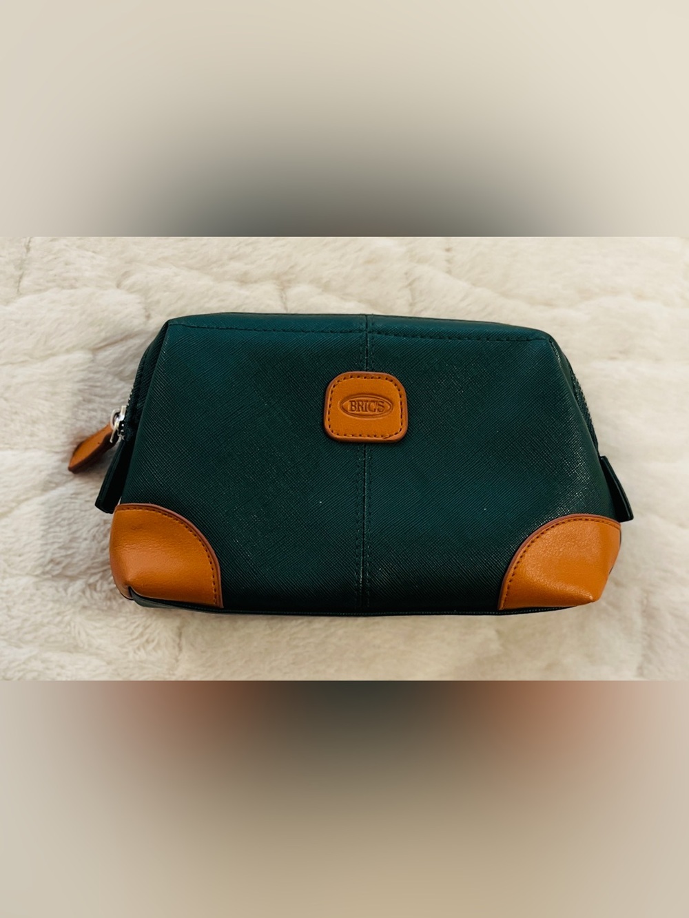 Bric's green faux-leather amenity kit bag. Unisex